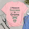 I Measure Success in Grams T‑Shirt — Funny Newborn Baby Weighing Mom/Dad Shirt